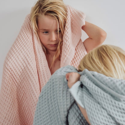 girls wearing organic cotton waffle towels