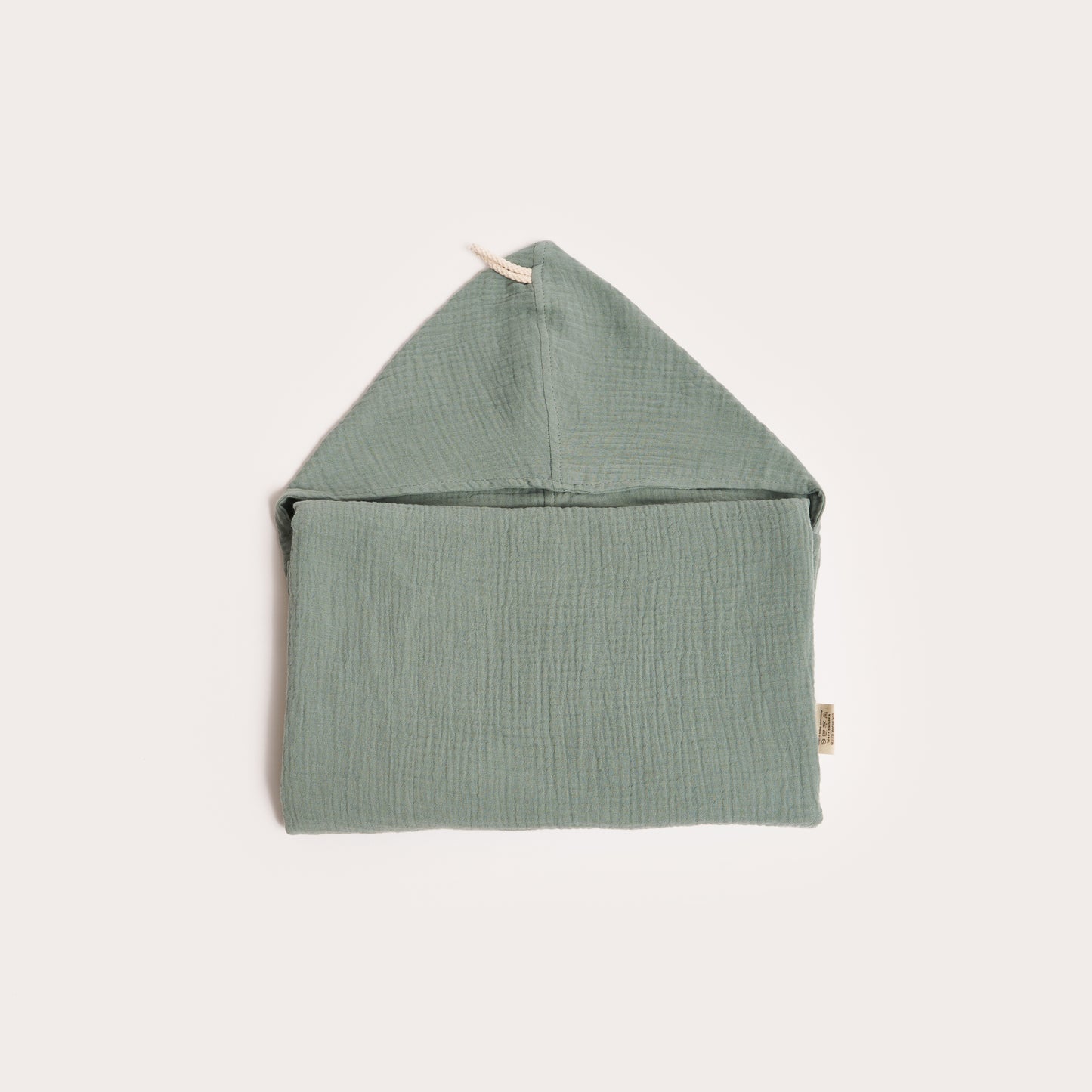 neatly folded storm green organic hooded cotton children's towel