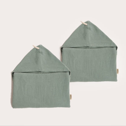 two neatly folded storm green organic hooded cotton children's towel